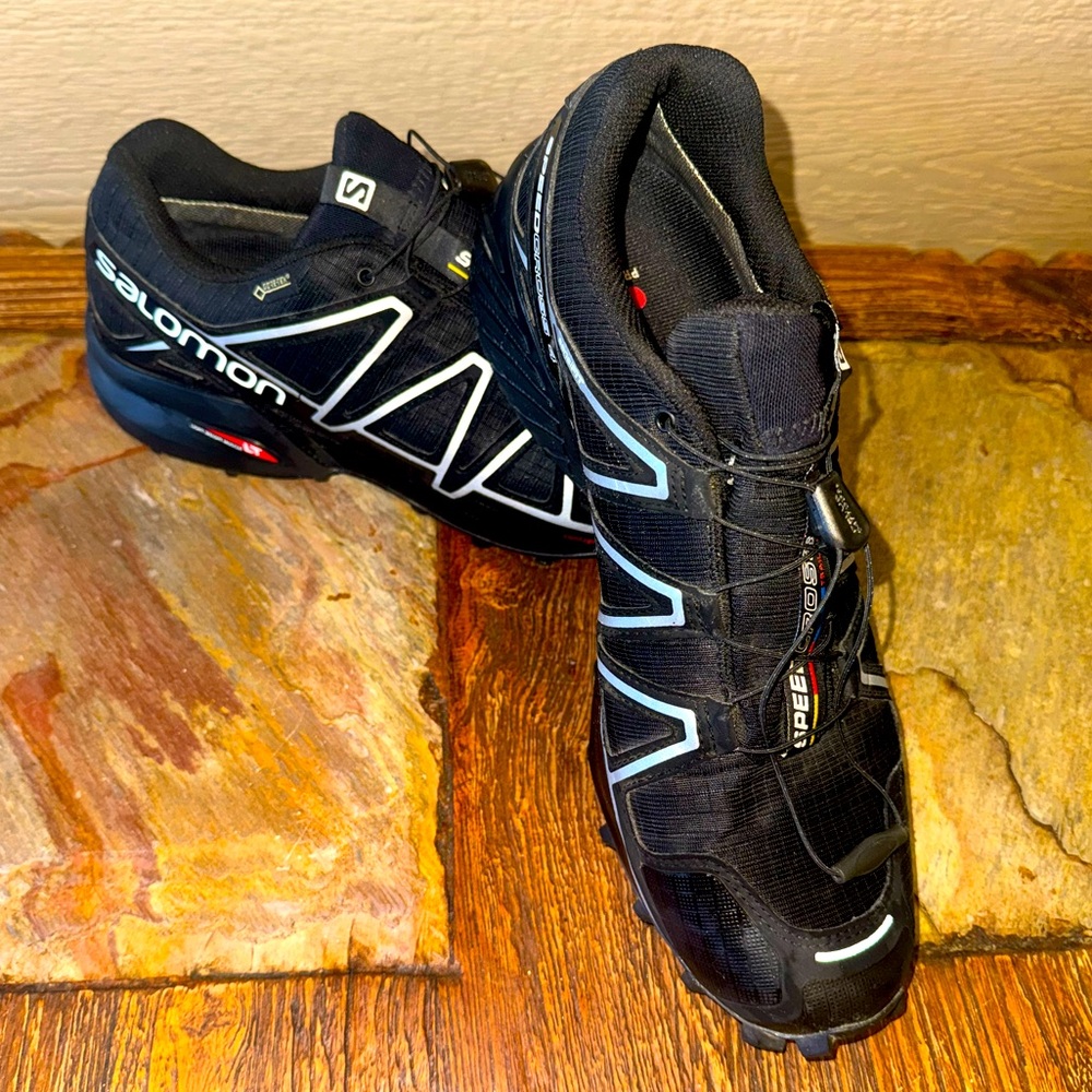 Salomon Black and White Athletic Shoes